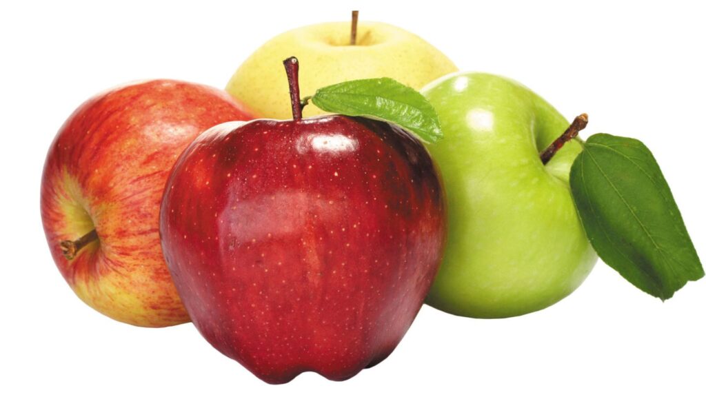 Red and green apples on table, natural energy snack
