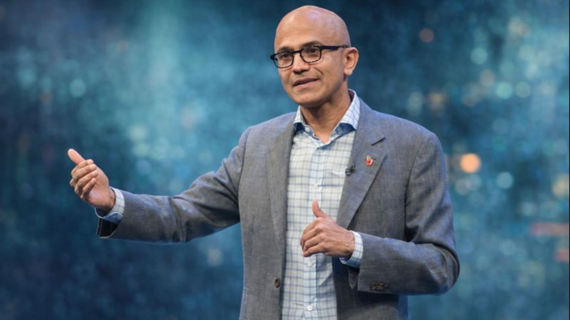 Satya Nadella delivering a keynote on Microsoft’s transformation and leadership.